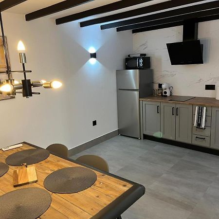 Apartamentos La Chimenea Merida Bagian luar foto
