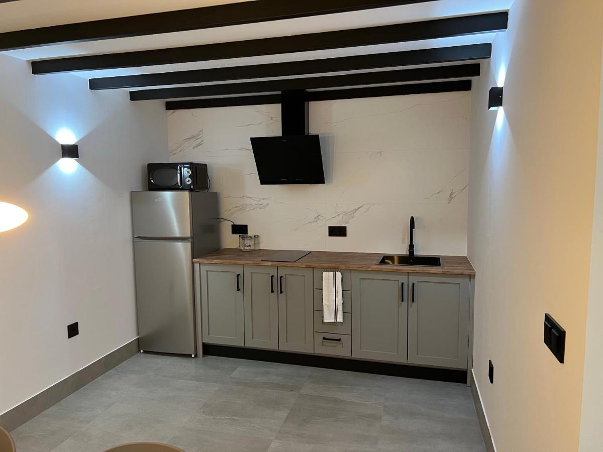 Apartamentos La Chimenea Merida Bagian luar foto