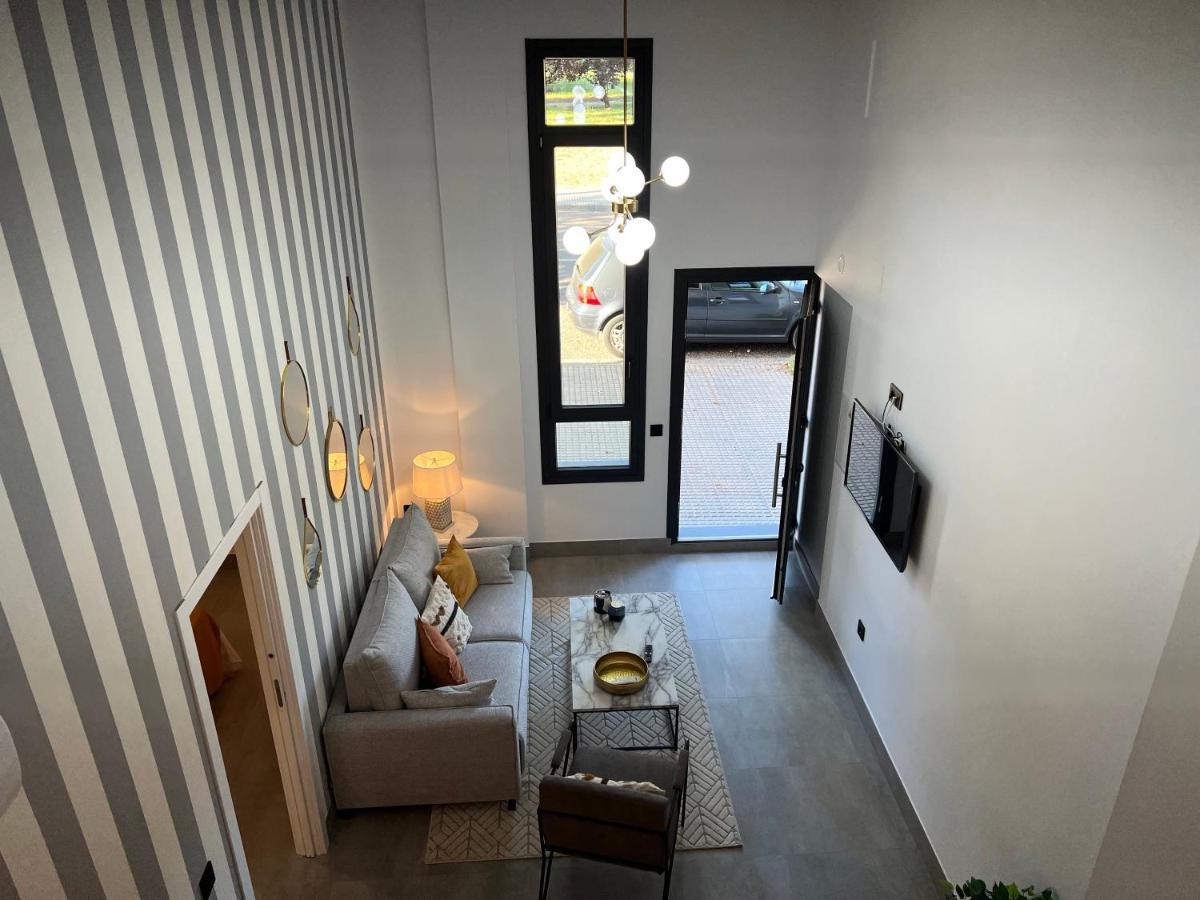 Apartamentos La Chimenea Merida Bagian luar foto