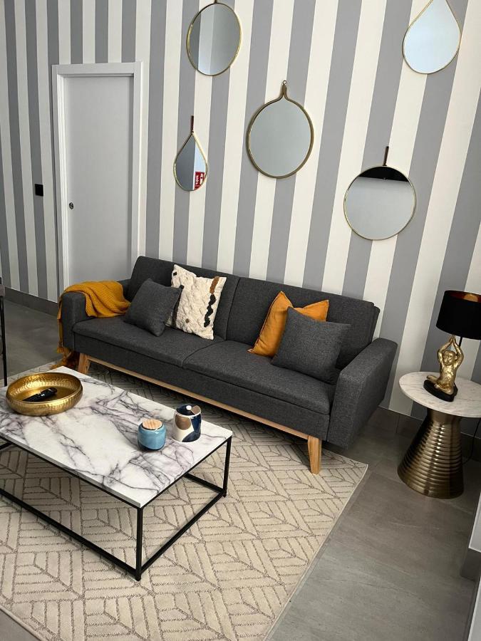 Apartamentos La Chimenea Merida Bagian luar foto