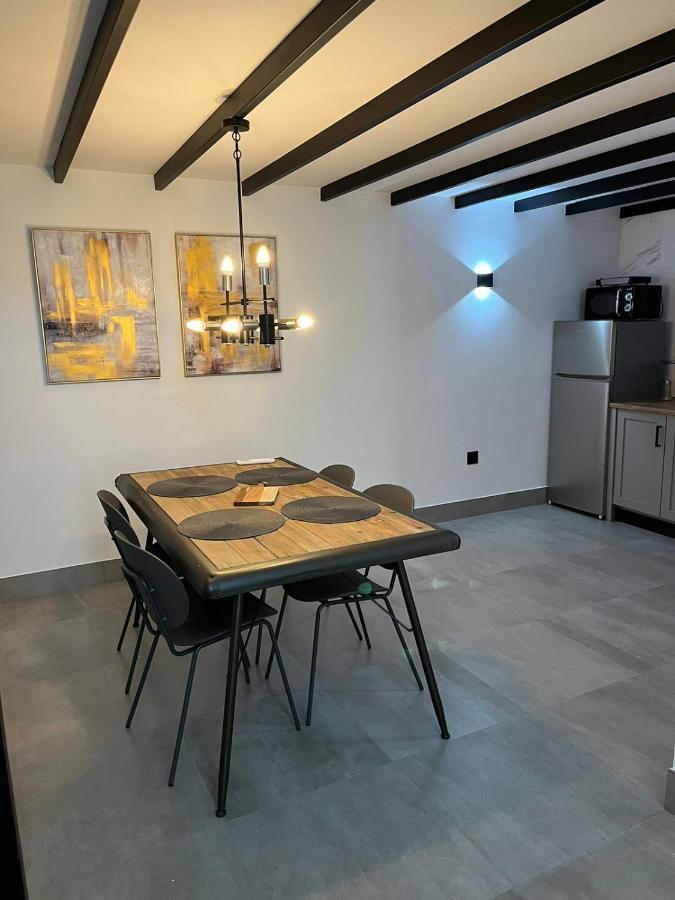 Apartamentos La Chimenea Merida Bagian luar foto