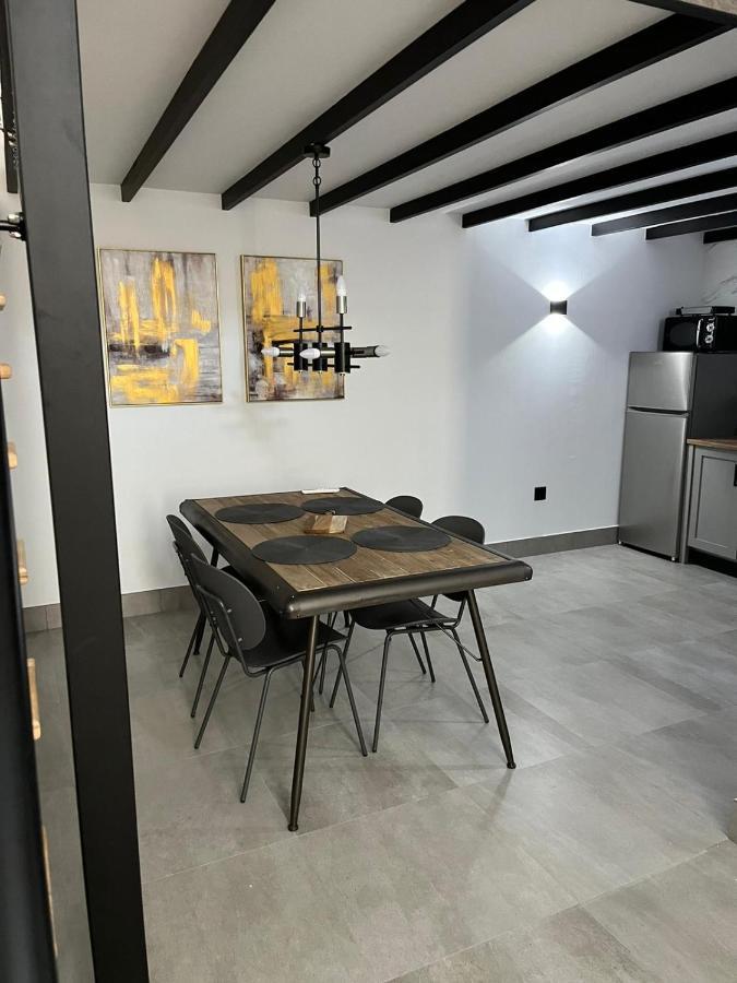 Apartamentos La Chimenea Merida Bagian luar foto