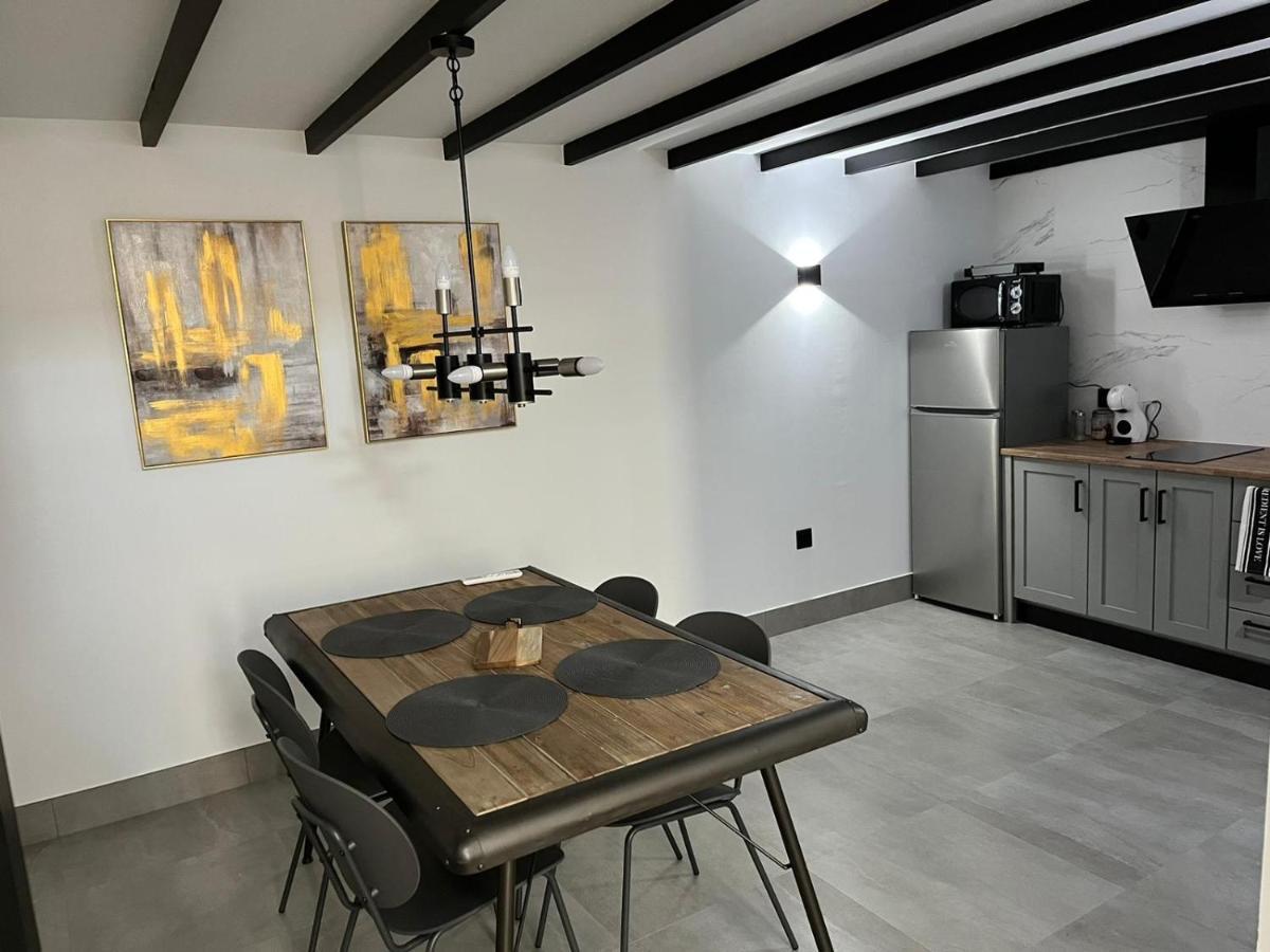 Apartamentos La Chimenea Merida Bagian luar foto