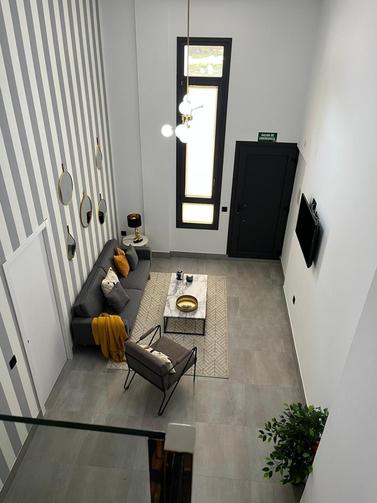 Apartamentos La Chimenea Merida Bagian luar foto